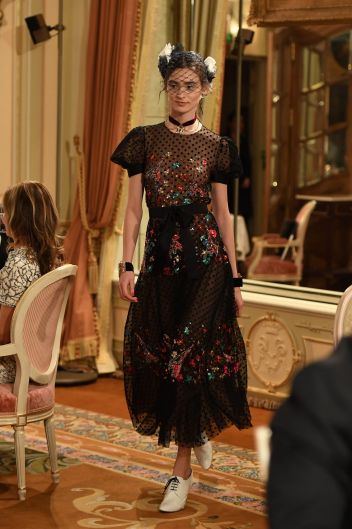 A model walks the runway during "Chanel Collection des Metiers d'Art 2016/17 : Paris Cosmopolite" show in Paris.