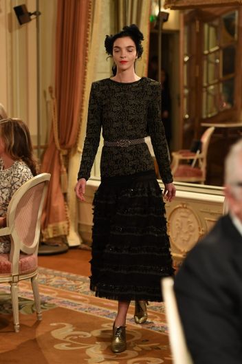 A model walks the runway during "Chanel Collection des Metiers d'Art 2016/17 : Paris Cosmopolite" show in Paris.