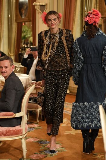 A model walks the runway during "Chanel Collection des Metiers d'Art 2016/17 : Paris Cosmopolite" show in Paris.