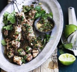 Sticky pork skewers with spiced lime dipping sauce.