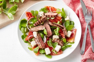 Barbecued beef with watermelon and watercress salad