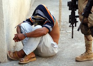 File - This detainee, captured today, was reportedly recruiting men from Fallujah to work with mortar teams in Baghdad against multinational forces in eastern Baghdad, Iraq.