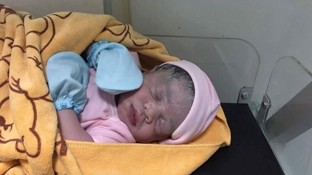 Cambodian Lux Clinic posted a photo of a minutes-old baby girl on Facebook following Hour Vanny's cesarean section on ...