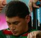 SYDNEY, AUSTRALIA - AUGUST 02: Kyle Turner of the Rabbitohs is assisted from the field after a concussion during the ...