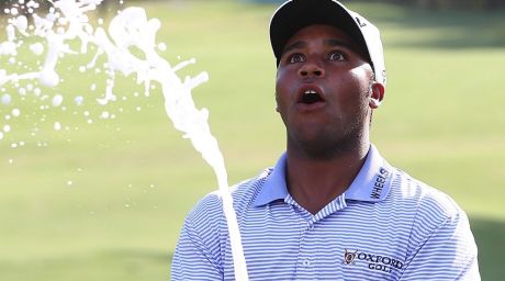 Spray it again: Harold Varner of the US celebrates after winning the Australian PGA Championship. 