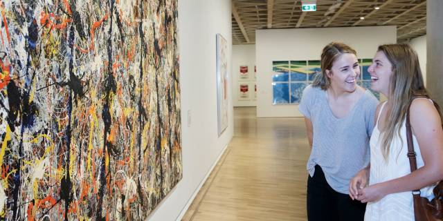 Women looking at art in the National Gallery of Australia, 2015