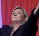 French far-right party leader Marine Le Pen gestures before a meeting in Lille, northern France.