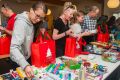 Volunteer Christine Baric helping to put together one of Prisoners Aid's Christmas hampers.