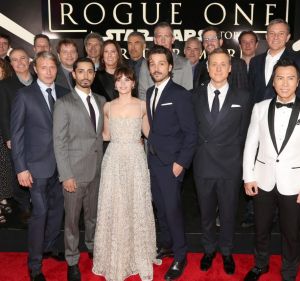 (L-R front row)  Actors Mads Mikkelsen, Riz Ahmed, Felicity Jones, Diego Luna, Alan Tudyk and Donnie Yen (back row) ...