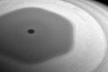 The Cassini spacecraft has filmed a strange hexagon-shaped storm spinning over the northern hemisphere of Saturn.