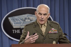 File - U.S. Southern Command Commander Marine Corps Gen. John F. Kelly briefs the media on the latest developments in his command's efforts to stem the flow of drugs from South and Central America in the Pentagon Press Briefing Room, March 13, 2014.