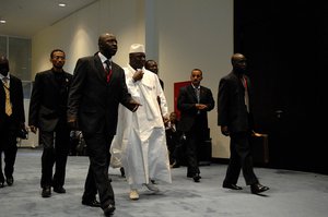 Gambian President Yahya Jammeh makes his way to a meeting during the Eleventh Ordinary Session of the Assembly of the Union in Sharm El Sheikh, Egypt