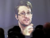 Edward Snowden speaks via video link during a conference at University of Buenos Aires Law School, Argentina, November 14, 2016. 