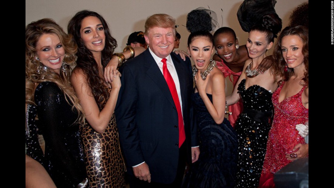 Trump poses with Miss Universe contestants in 2011. Trump had been executive producer of the Miss Universe, Miss USA and Miss Teen USA pageants since 1996.