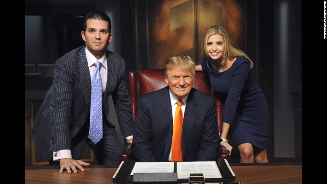 Trump appears on the set of &quot;The Celebrity Apprentice&quot; with two of his children -- Donald Jr. and Ivanka -- in 2009. 