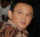 Jakarta Governor Basuki Tjahaja Purnama, popularly known as Ahok, sits on the defendant's chair at the start of his ...