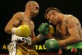 Anthony Mundine and Danny Green, who met in a famous stoush in Sydney in 2006, will clash again in Adelaide in February. 
