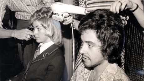 Rose Evansky's hairdressing technique has been a perpetual hit, here customers get a blow wave at a unisex hair salon in ...