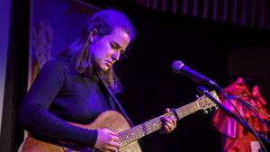 Mia Wray performs Paul Kelly's 'To Her Door' at the announcement of the Australian Music Vault.