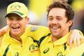 Little to smile about: Australian skipper Steve Smith and debutant Travis Head celebrate another wicket on the way to a ...