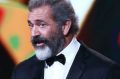 Mel Gibson wins the AACTA Award for best direction for Hacksaw Ridge during the 6th AACTA Awards in Sydney, Australia.