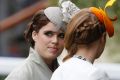 Prince Andrew's daughters Princesses Beatrice and Eugenie. 