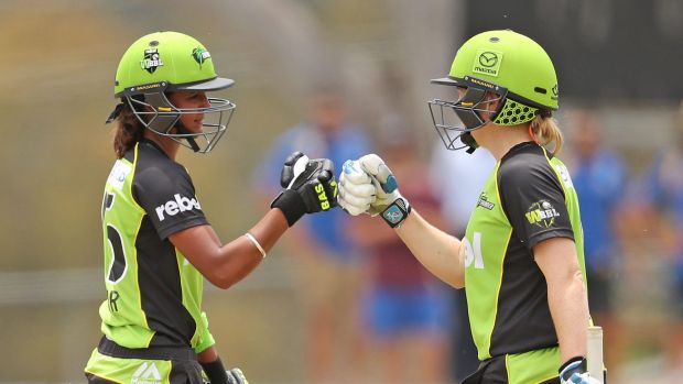 Alex Blackwell and Harmanpreet Kaur celebrate a six.