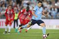 Bobo of Sydney FC scores a goal from the spot.