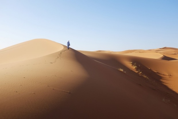 During the warmest part of the year, Moroccans come to Erg Chebbi to be buried neck-deep in the hot sand for a few ...