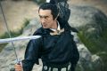 The fresh-faced Gengxin Lin plays the sword master of the title