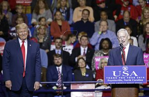 President-elect Donald Trump, left, listens to retired United States Marine Corps General James Mattis after appointing Mattis as upcoming Secretary of Defense while speaking to supporters during a rally in Fayetteville, N.C., Tuesday, Dec. 6, 2016.