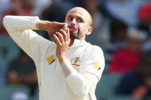 ADELAIDE, AUSTRALIA - NOVEMBER 24: Nathan Lyon of Australia bowls during day one of the Third Test match between ...