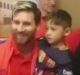 Famous meeting: Murtaza Ahmadi, left, with his plastic bag jumper and with Lionel Messi.