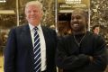 President-elect Donald Trump and Kanye West pose for a picture in the lobby of Trump Tower.