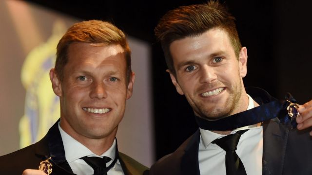 The new medallists: Sam Mitchell and Trent Cotchin.