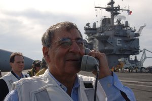 Secretary of Defense Leon Panetta speaks to pilots during flight operations.