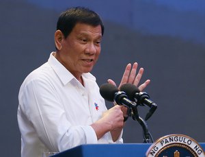 Philippine President Rodrigo Duterte gestures during his address to Filipino business sector in suburban Pasay city south of Manila, Philippines