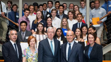 NSW ministers Adrian Piccoli and Leslie Williams, at right, with school students who topped an HSC subject.