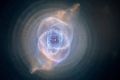 Hubble's record of a Cat's Eye Nebula - a visual "fossil record" of the dynamics and late evolution of a dying star.