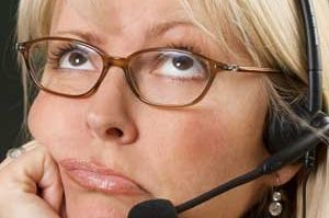 Bored telephone operator, call centre, Telstra, telco, telecomms, phone company