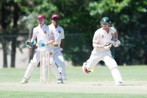 John Rogers of Weston Creek scores 100 runs.