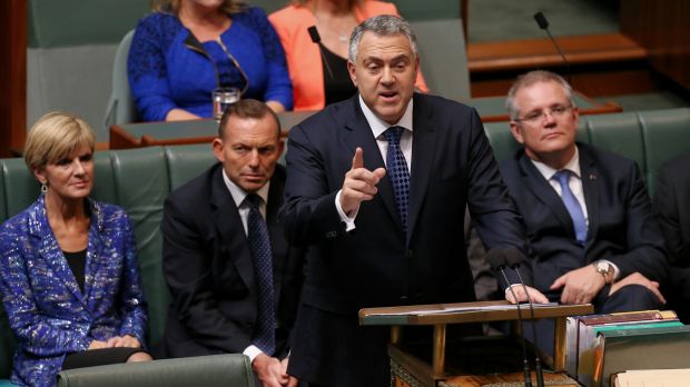 Treasurer Joe Hockey hands down the Budget in the House of Representatives.