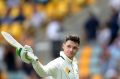 Handscomb salutes the crowd after his dismissal for 