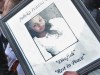 A relative holds a picture of 22 yr old Julieka Dhu in front of WA Premier Colin Barnett during a death in custody rally outside Parliament House. Ms Dhu died in a Port Hedland after being detained over unpaid fines.   Picture: Bill Hatto  23 October 2014  The West Australian   ***  ***