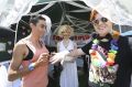 Couples say "I do" at the 2016 Midsumma Carnival.