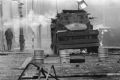 A British Army armoured vehicle makes its way along a barricade while on patrol in the Lower Falls area of west Belfast. ...