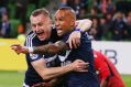 Besart Berisha and Archie Thompson.