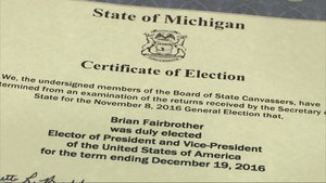 In this image from video, the certificate that states that Brian Fairbrother is a duly elected Electoral College elector is photographed in Shelby Township, Mich., on Tuesday, Dec. 13, 2016.