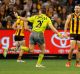 On your bike: Luke Hodge gives away a 50m penalty on Friday night.