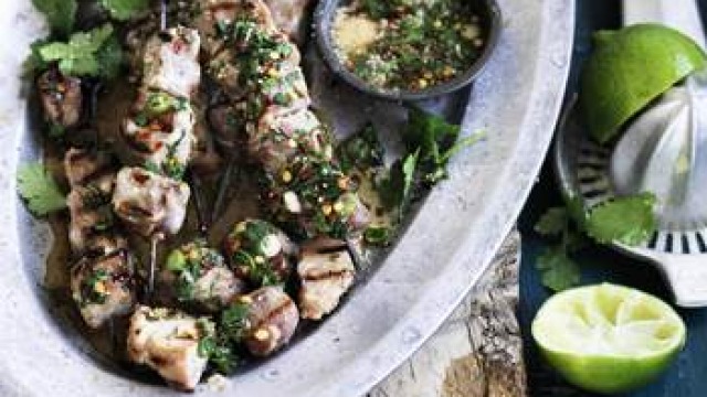 Sticky pork skewers with spiced lime dipping sauce.